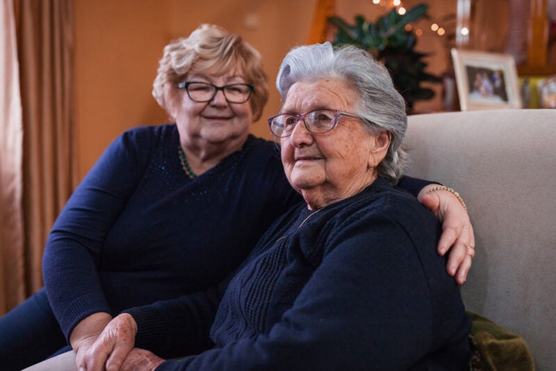A mother and daughter who have a reverse mortgage together.
